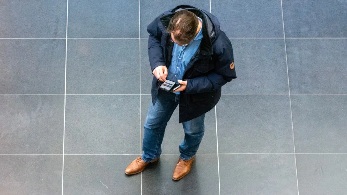 Person applying for second chance loans online on a smartphone