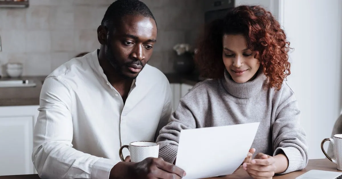 Brampton residents comparing personal loans online on a laptop and phone