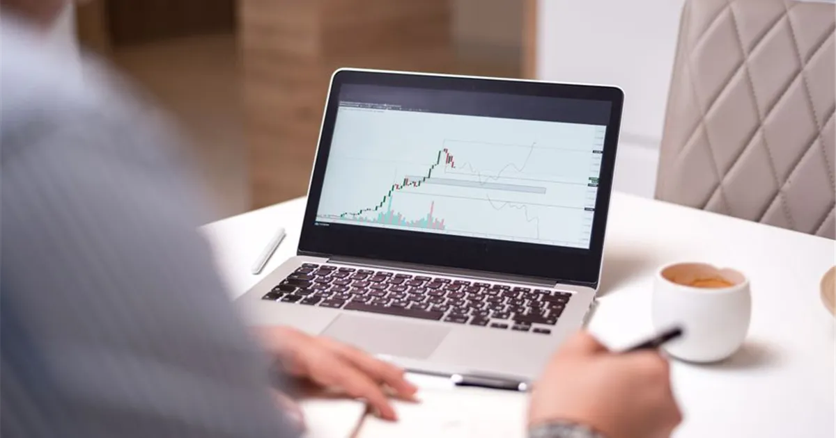British Columbians comparing personal loans online on a laptop and phone