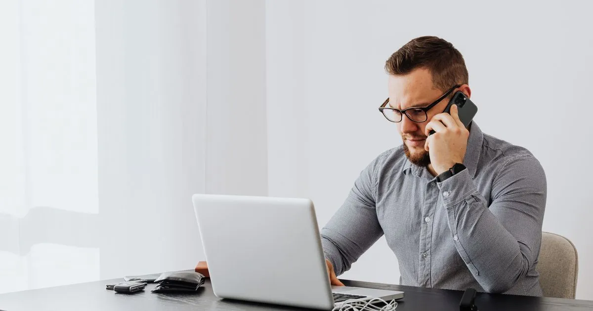 London residents comparing personal loans online on a laptop and phone