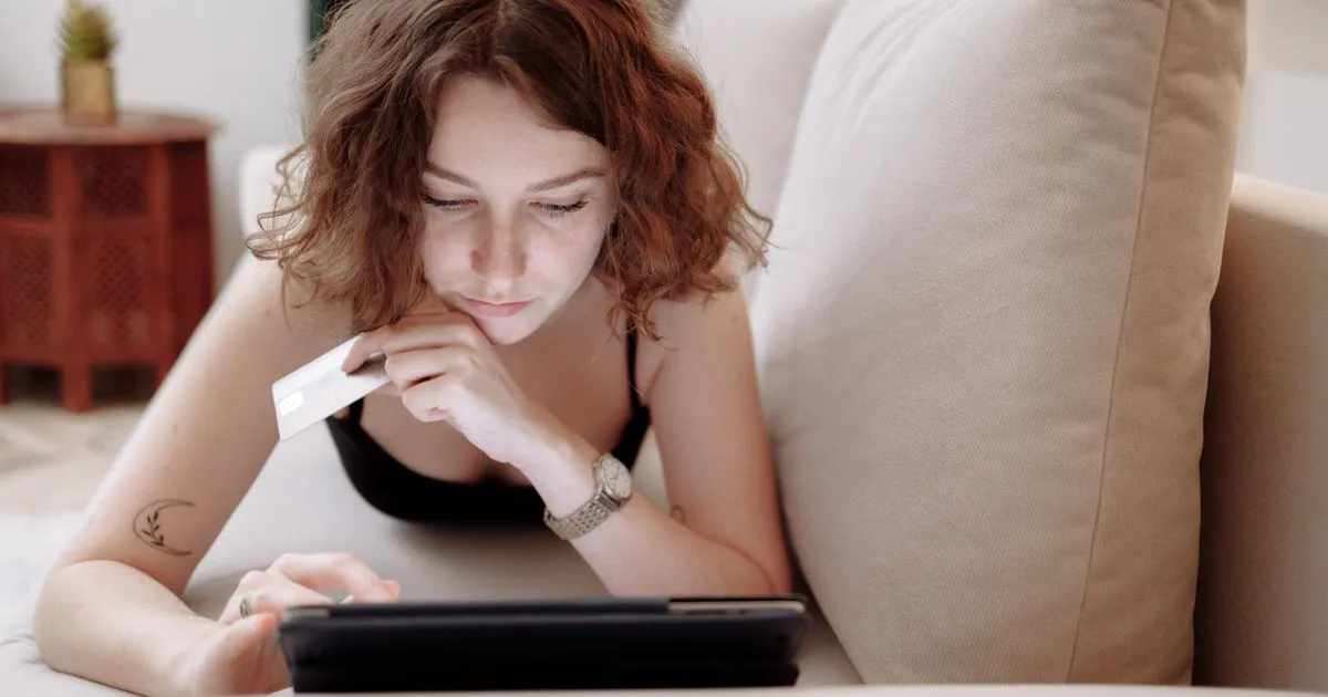 Markham residents comparing personal loans online on a laptop and phone