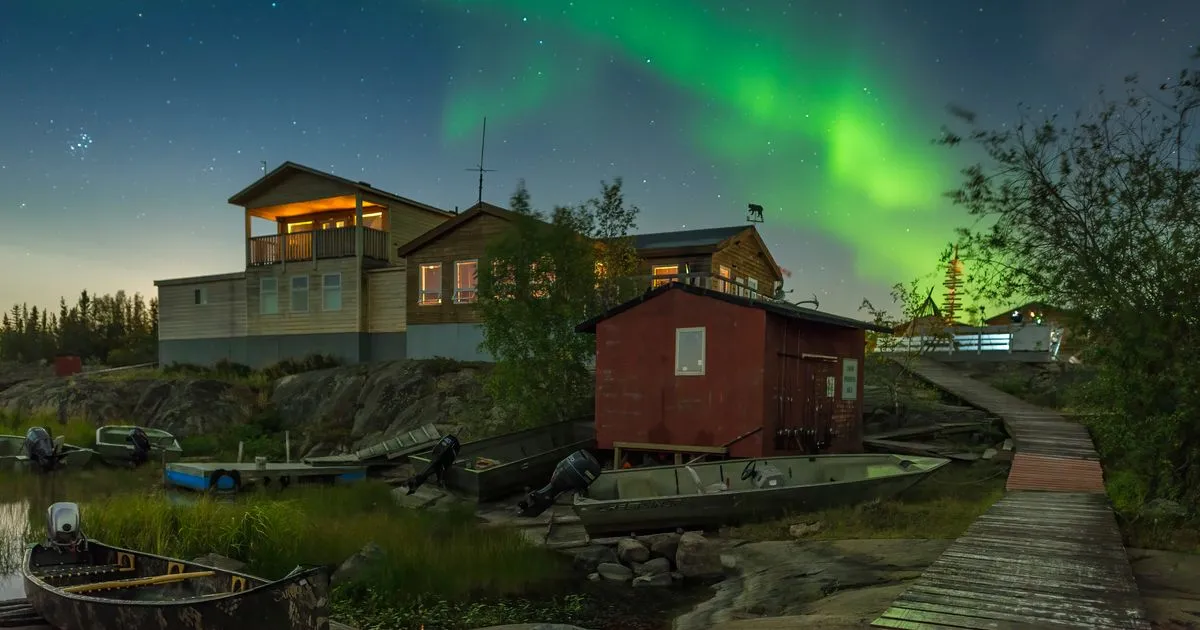 Borrowing in the Northwest Territories - aurora over Yellowknife