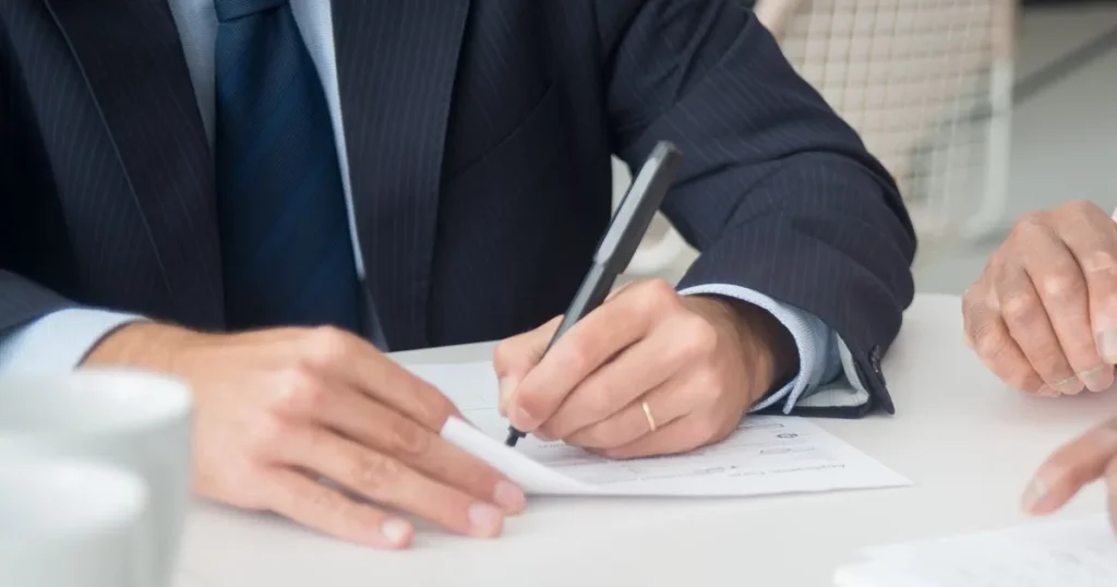 Co-signer vs guarantor signing a loan agreement in Canada