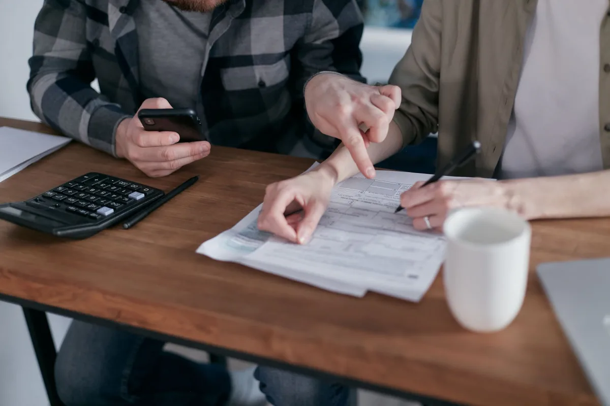 Couple developing a repayment plan for a consumer proposal in Canada