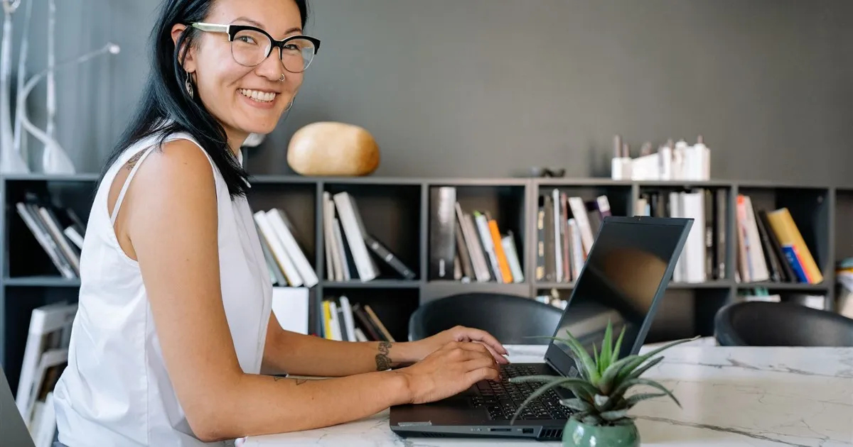 Checking your credit report on a laptop in Canada