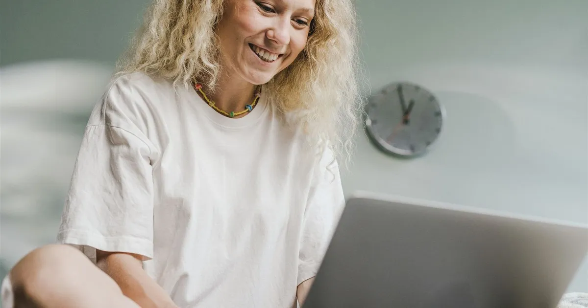 Checking your credit score on a laptop in Canada