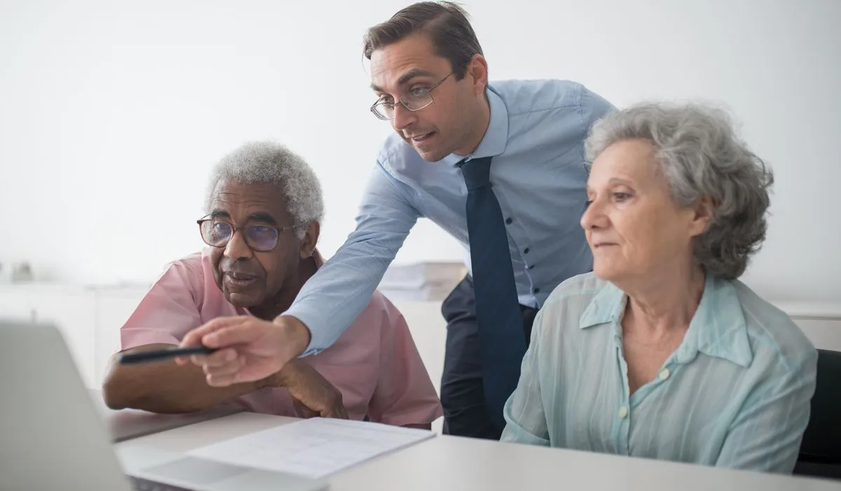 Advisor explaining the process options to clients in Canada