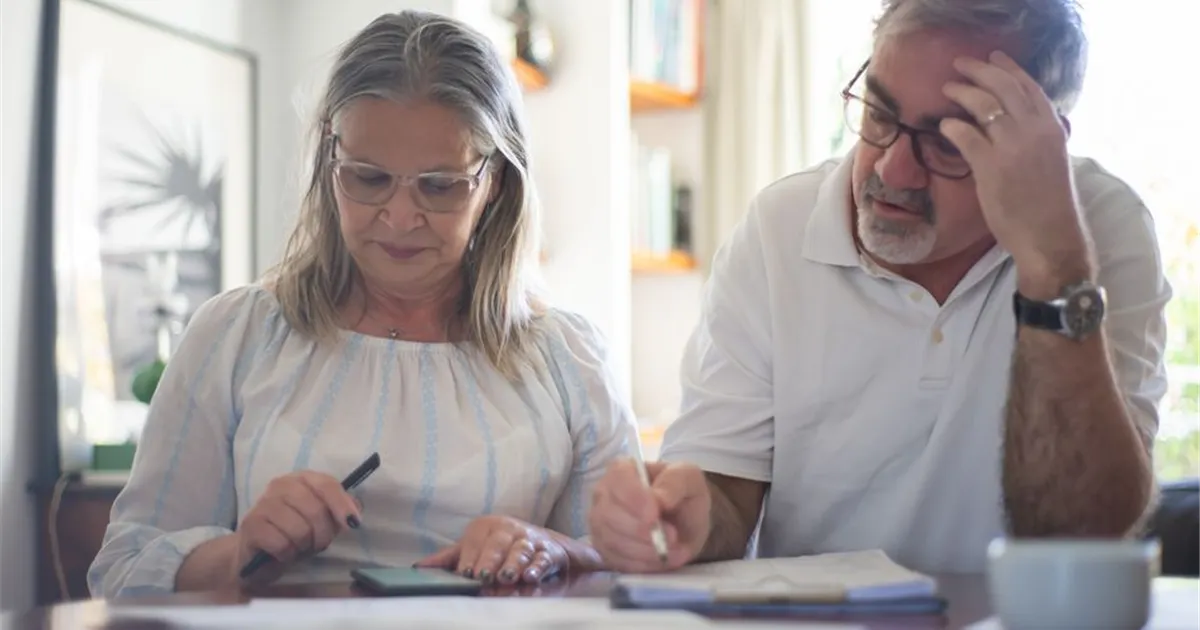 Couple managing a debt consolidation loan in Canada