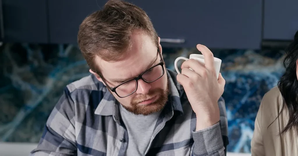 Couple calculating their debt-to-income ratio in Canada