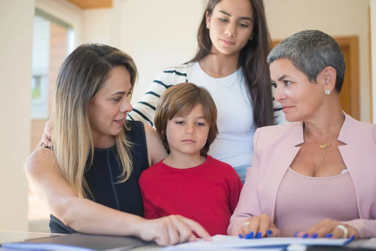 Family discussing who can act as a guarantor for a loan in Canada