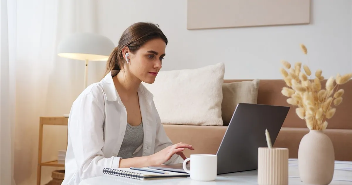 Comparing high interest savings accounts on a laptop in Canada