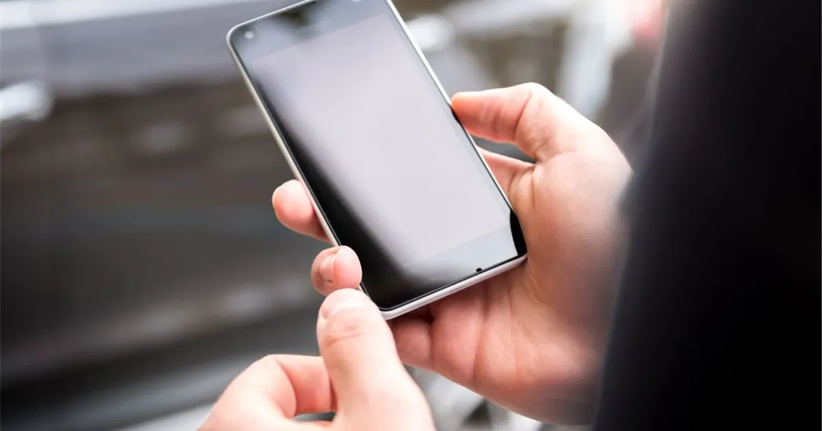 Applying for an instant e-transfer loan on a smartphone in Canada