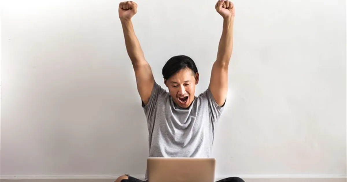 Canadian celebrating getting approved for a loan