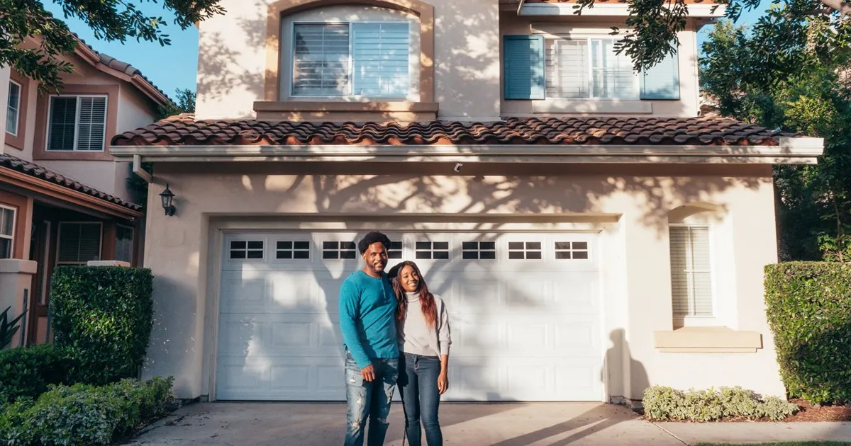 Family at their new home after getting a mortgage in Canada