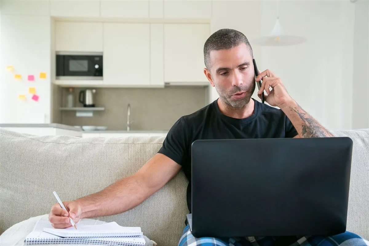 Man applying online for payday loans in Ontario, Canada