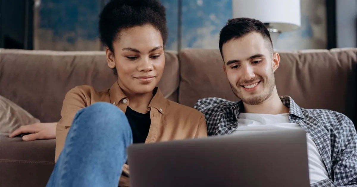Canadian couple planning a personal loan together at home