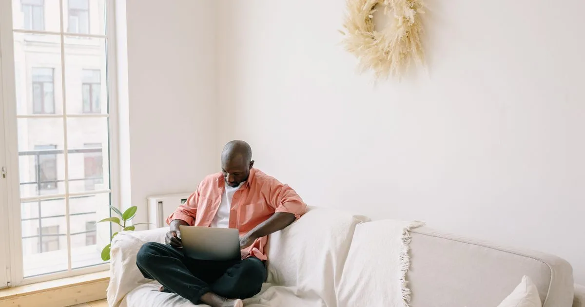 Man applying for a quick loan no phone calls from home in Canada