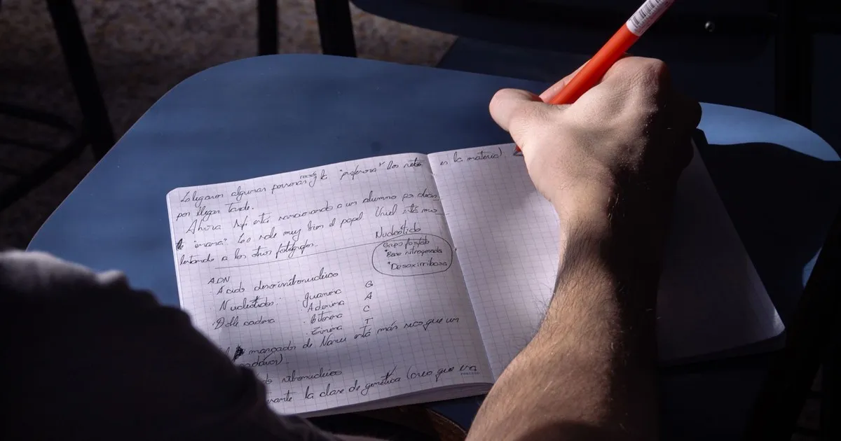 Student writing notes in Canada