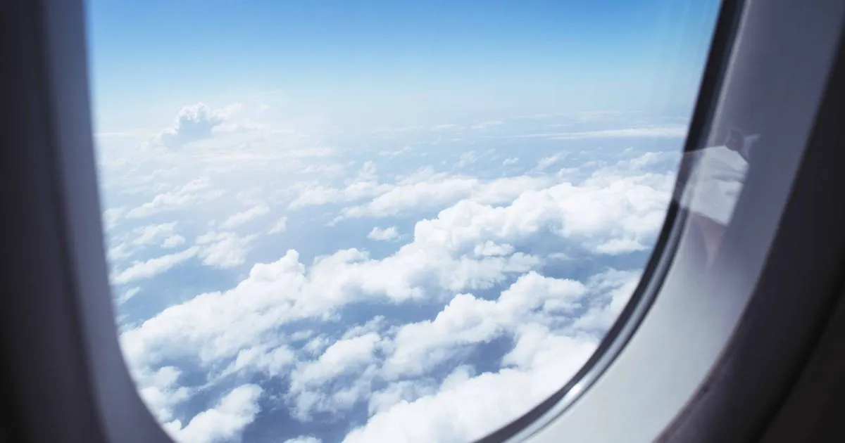 Travel insurance for Canadians - view of clouds from an airplane window