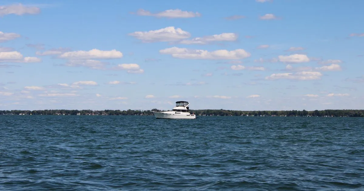 Borrowing in Barrie - boat on Lake Simcoe on a clear summer day