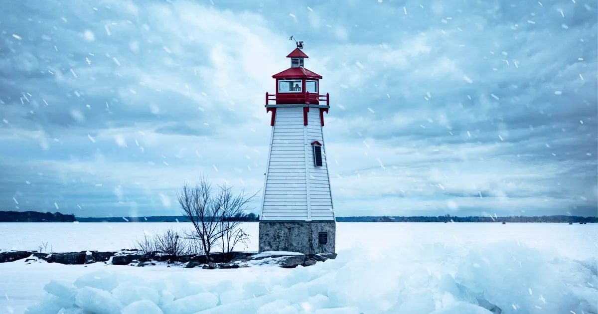 Lighthouse on frozen Lake Simcoe during a winter storm near Barrie