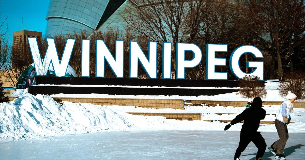 No credit check loans Manitoba - skaters at the Winnipeg sign at The Forks in winter