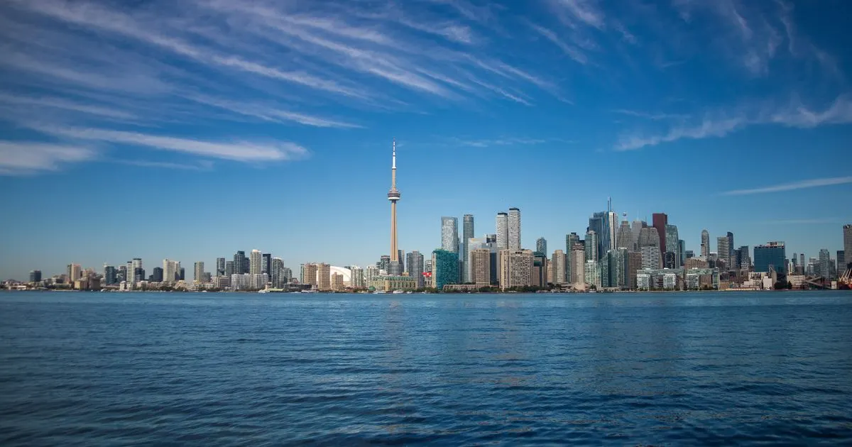 No credit check loans Ontario - the Toronto skyline and CN Tower across the harbour