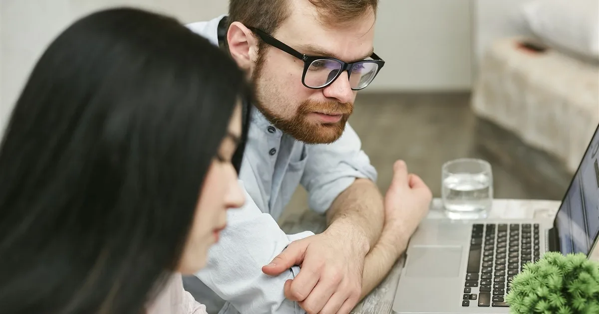 Peer-to-peer loans Canada - borrower reviewing a P2P lending platform offer on a laptop